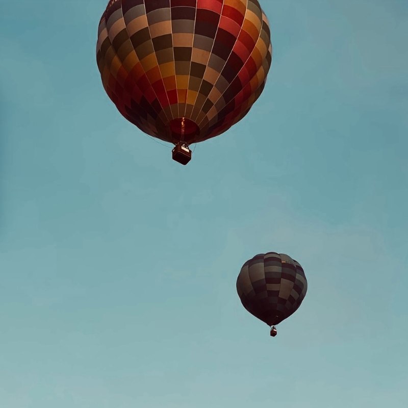 Hot air balloon over Ibiza at sunrise